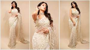 With her dreamy ivory saree, Nora Fatehi looks stunning as an elegant princess and sets the standard for wedding elegance. It is expensive.