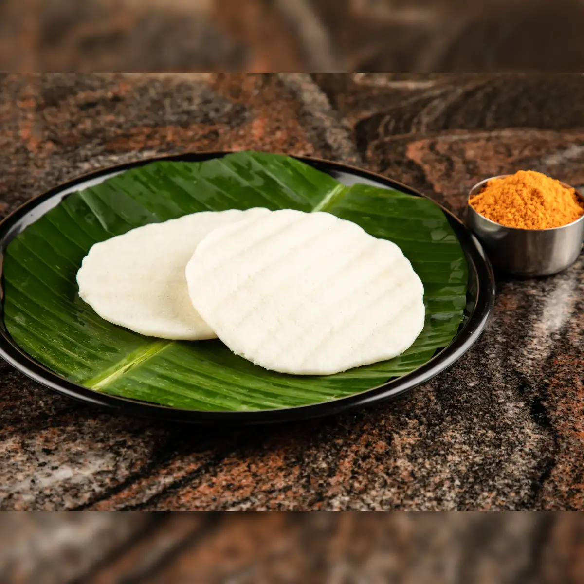 Experts comment on the Karnataka health department's prohibition on plastic sheets for steaming idlis in hotels, which highlights harmful chemicals and cancer risks.