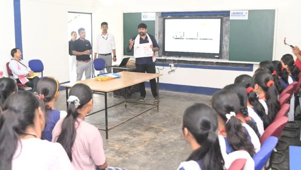A teacher from Assam receives the National Teachers Award for traveling 150 km each day through a national park to get to school.